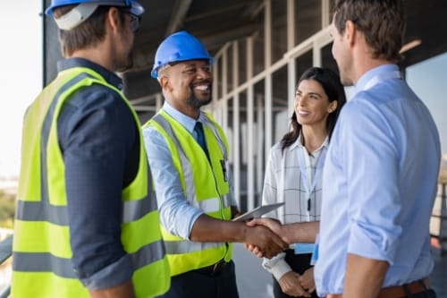 east coast enterprises contractors shaking hands